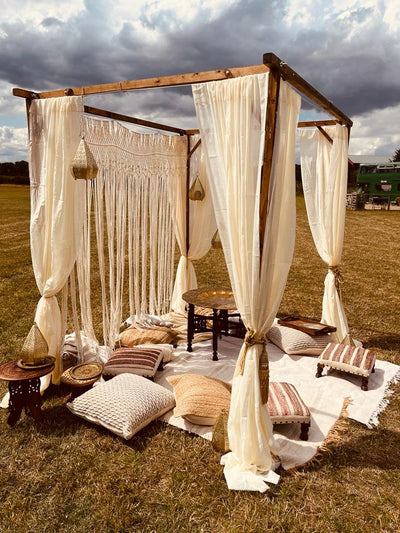 Hire our Moroccan Style Chillout Package! Featuring a canopy and low seating, this package is perfect for creating a cozy and unique atmosphere | Furniture hire