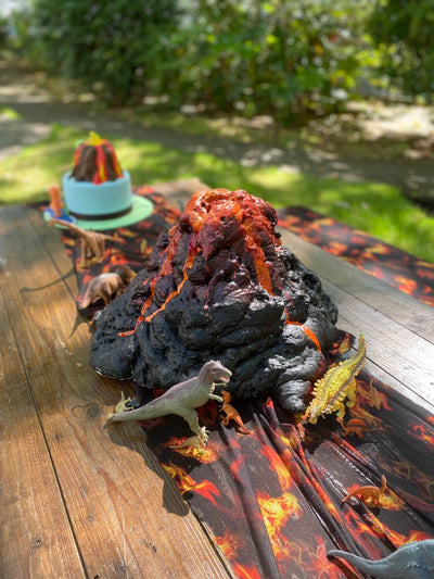 Elevate your lava-themed party with the Volcano Centrepiece! Standing tall on the table, this centrepiece adds a volcanic touch to your event | Themed event hire