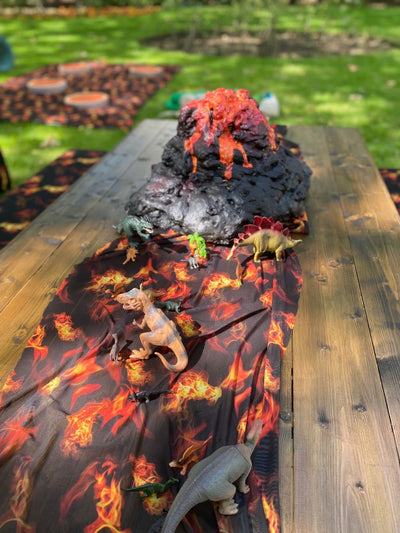 Elevate your event with our Floor is Lava themed table runner.The perfect addition to your themed party | Event prop hire London | Themed event hire | Prop hire