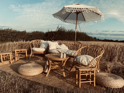 bamboo seating package for hire with macrame parasol | furniture hire Essex | prop hire b y Rock the Day Essex | Wedding and events styling in London and surrounded counties