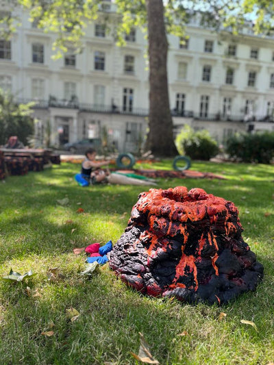 Elevate your party with our Volcano Toss themed game for hire! Themed event hire London | Floor is Lava themed party props | Prop hire by Rock the Day Essex | 