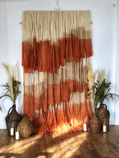 Bohemian photo backdrop for hire. We cover Essex, London, Hertfordshire. Party props, event styling, branding shoots, visual merchandising, interior design, backdrops to hire, furniture rugs and textiles to hire Rock The Day