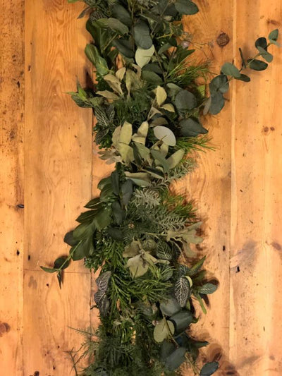 Faux greenery garland for hire as party decor or photoshoot prop. Essex, London, Hertfordshire