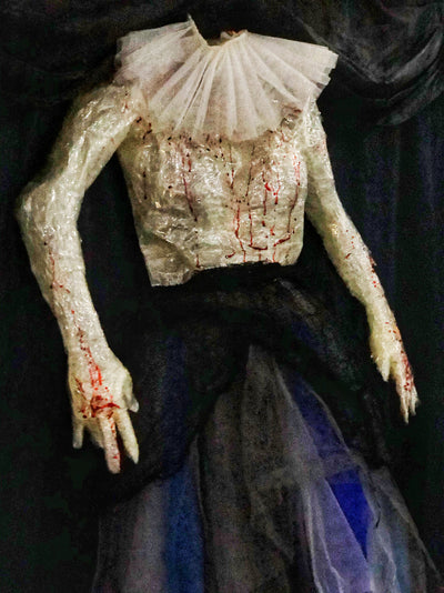 Bloody corpse in tutu skirt. Halloween party decorations, photoshoot props for hire in Essex, London, Hertfordshire.