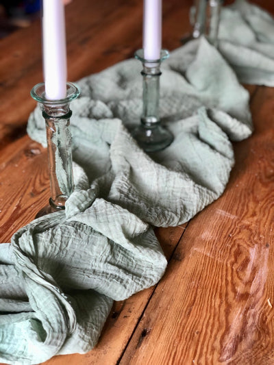 Hire our new hand dyed sage green muslin runner | Wedding prop hire Essex | Event prop hire London by Rock the Day | Party decorations hire | 