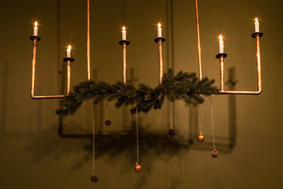 Christmas decor hire - copper pipe chandelier - style your Christmas with our props. Rock the Day in Essex