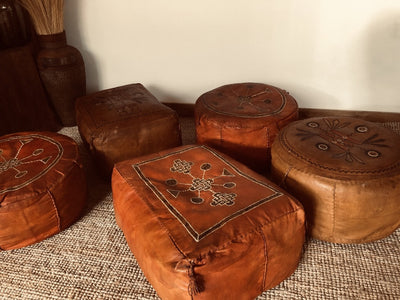 Vintage Boho Leather Pouffe for hire | Boho decor hire | Party props hire Essex | Low seating area in bohemian style for hire by Rock the Day Essex 