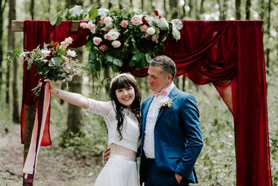 Burgundy drapes on rustic wooden arch for hire | backdrops for hire | party and event styling | Rock the Day Essex, London
