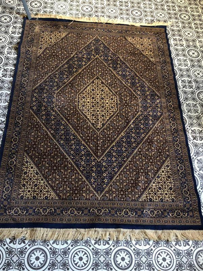 Small Persian style rug for hire  Rock the Day Essex | wedding hire | props hire  | furniture rugs and textiles to hire | wedding prop hire