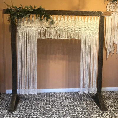 Wooden arch with macrame backdrop for hire