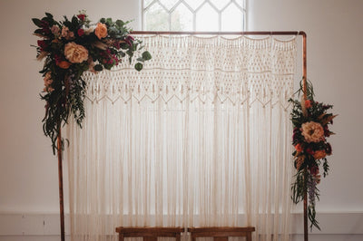 Macrame backdrop with copper pipe stand for hire | backdrops to hire | macrame hire London | Boho style parties and events, Rock the Day, Essex