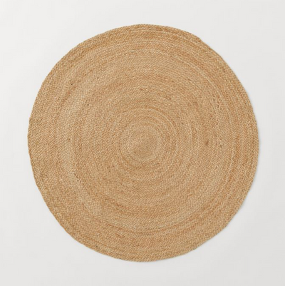 Jute plain round rug for hire | Wedding and event prop hire Essex by Rock the Day | Wedding and Event styling London | Prop hire | Boho decor hire Essex