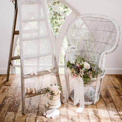 White Bohemian Style Peacock Chair for hire by Rock the Day, Essex